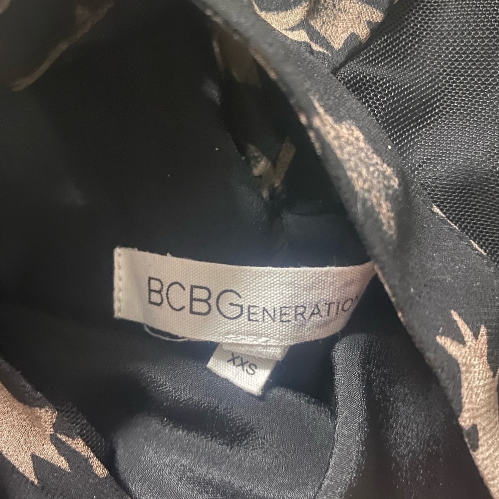BCBGeneration Flowy Halter style Pleated Black Dress with Blush Star Motif - Picture 6 of 7